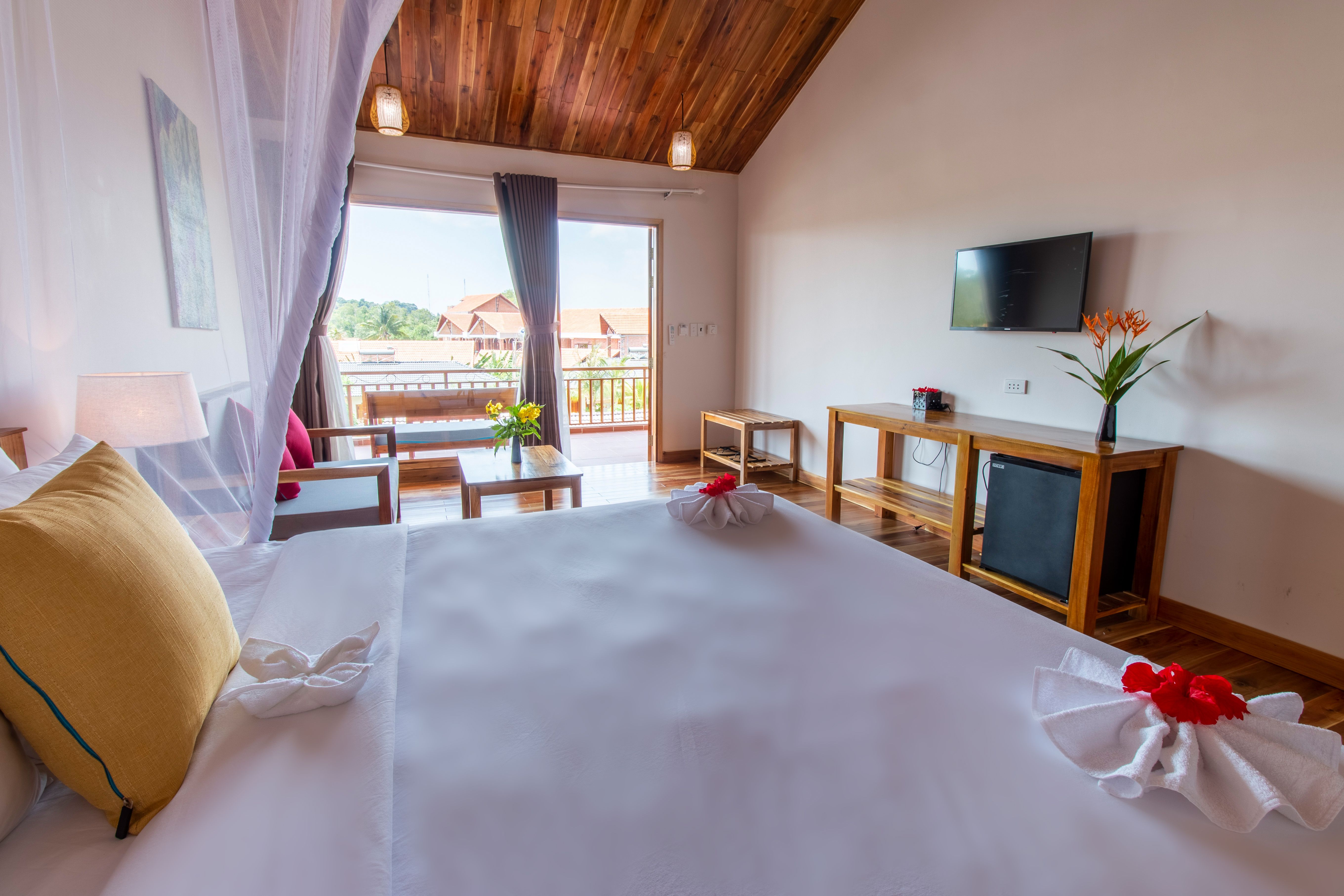 DELUXE SUITE DOUBLE GARDENVIEW WITH BALCONY