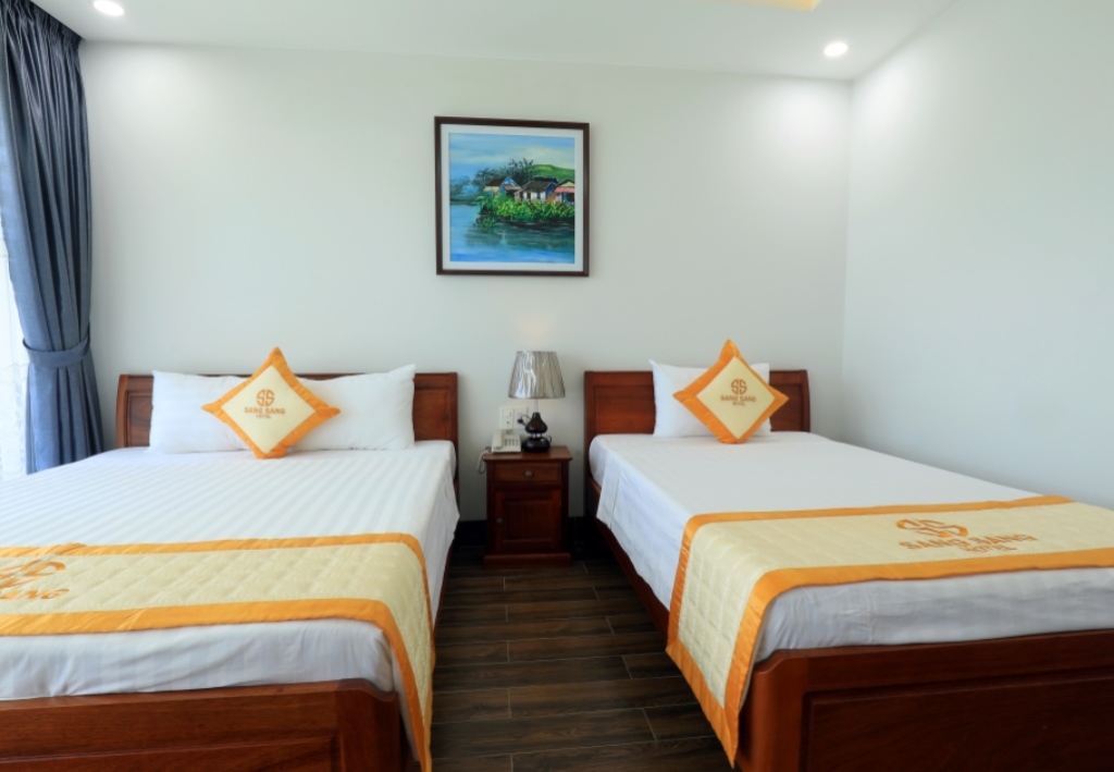 DELUXE TRIPLE ROOM WITH BALCONY