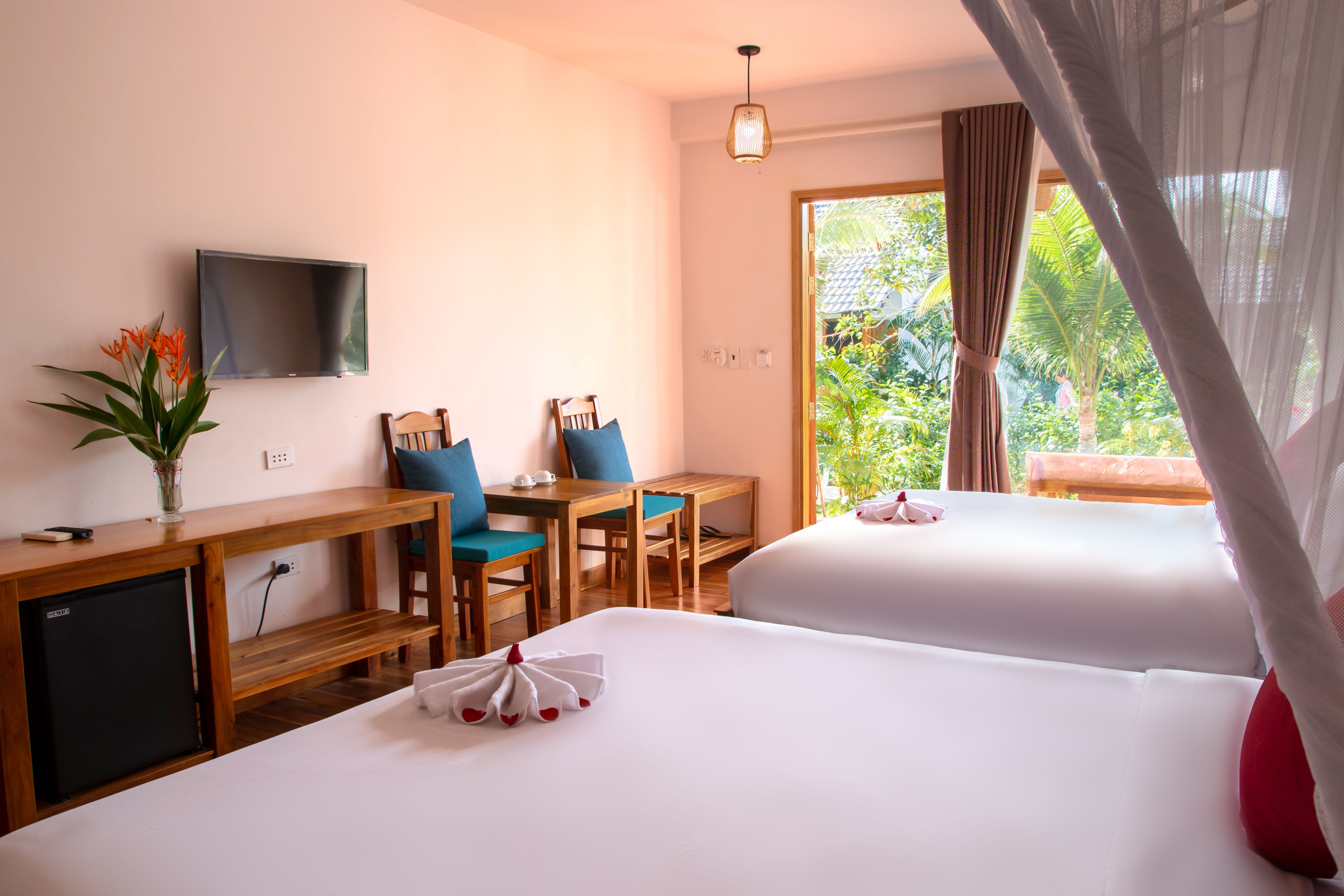 DELUXE SUITE DOUBLE GARDENVIEW WITH BALCONY