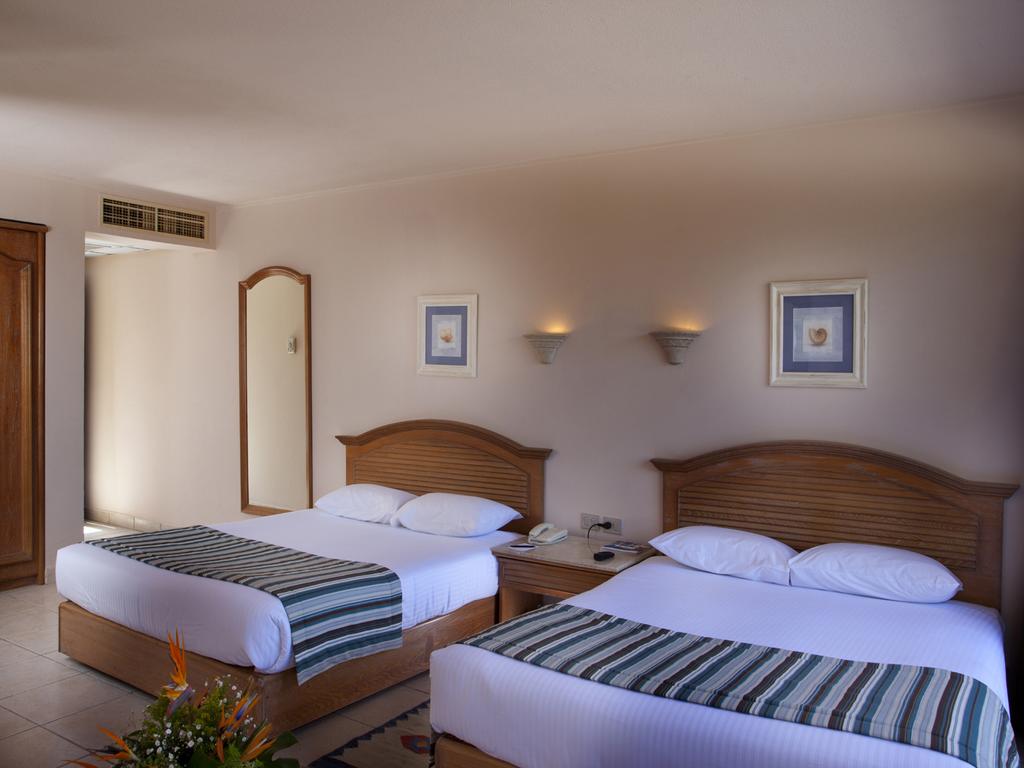 hurghada-coral-beach-hotel-triple-room-with-sea-view-31_15558281841.jpg