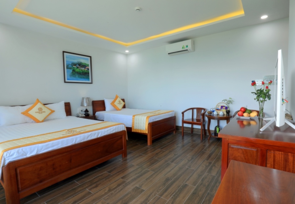 DELUXE TRIPLE ROOM WITH BALCONY