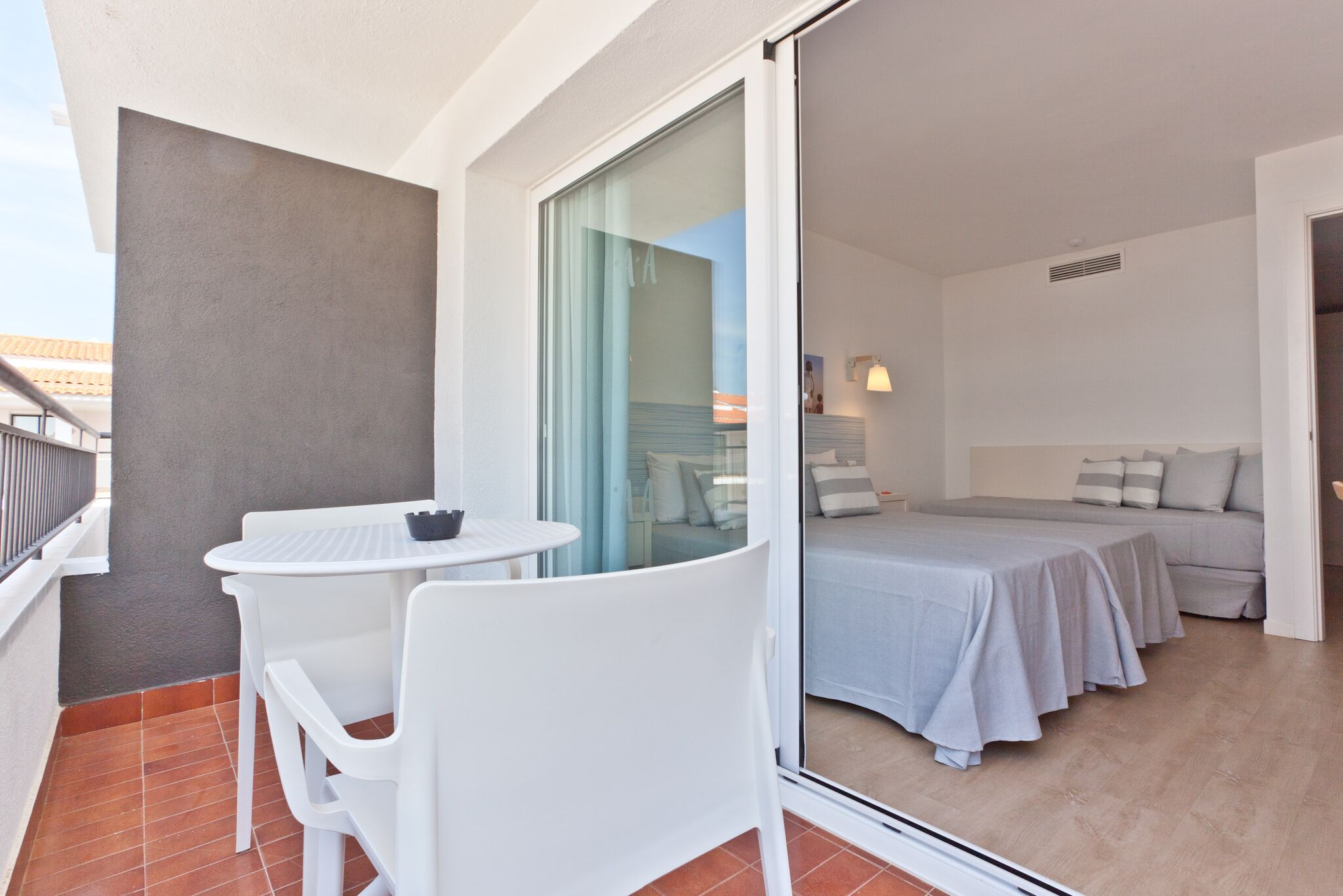 DELUXE FAMILY ROOM BALCONY OR TERRACE