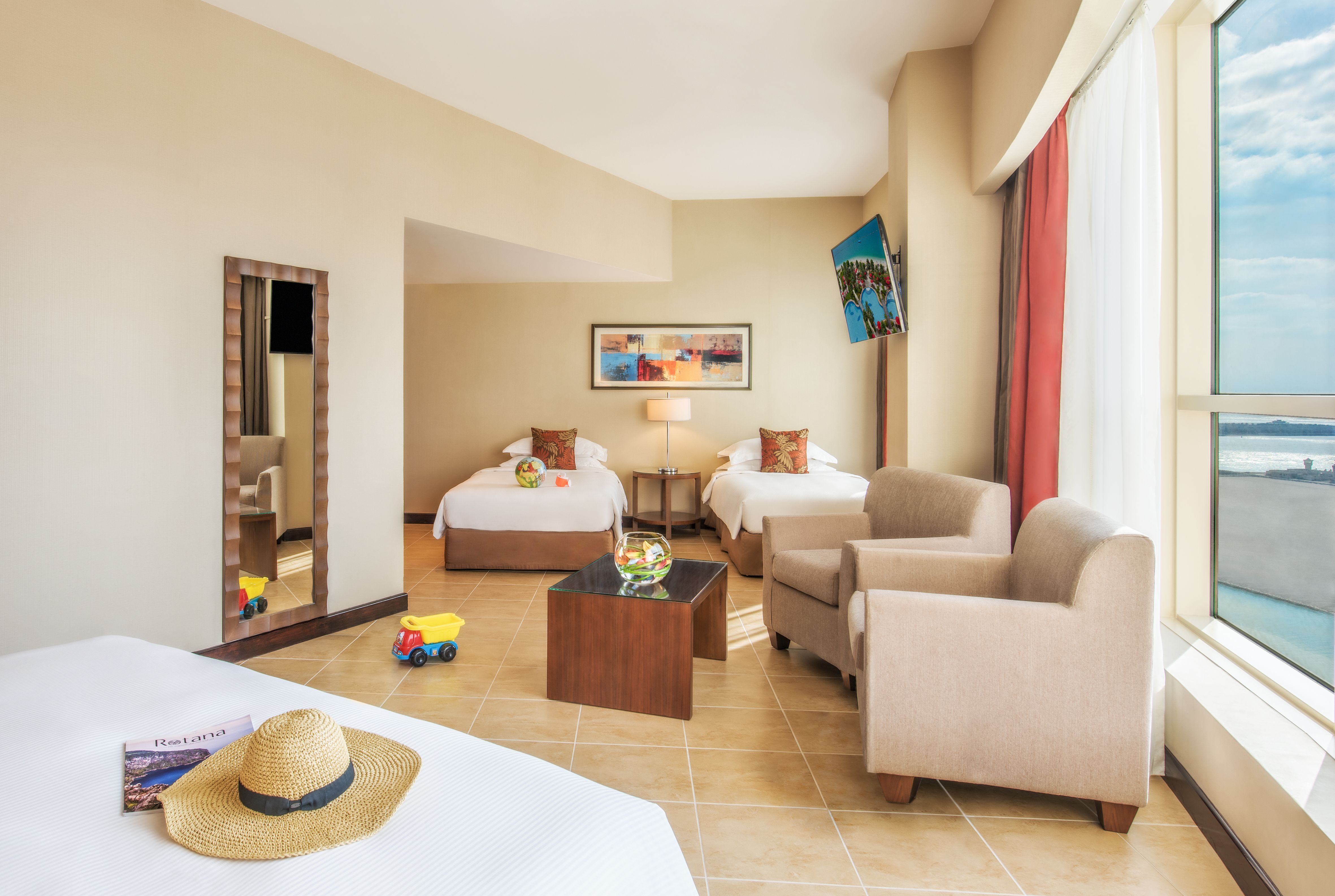 FAMILY ROOM W/ KITCHENETTE & BALCONY