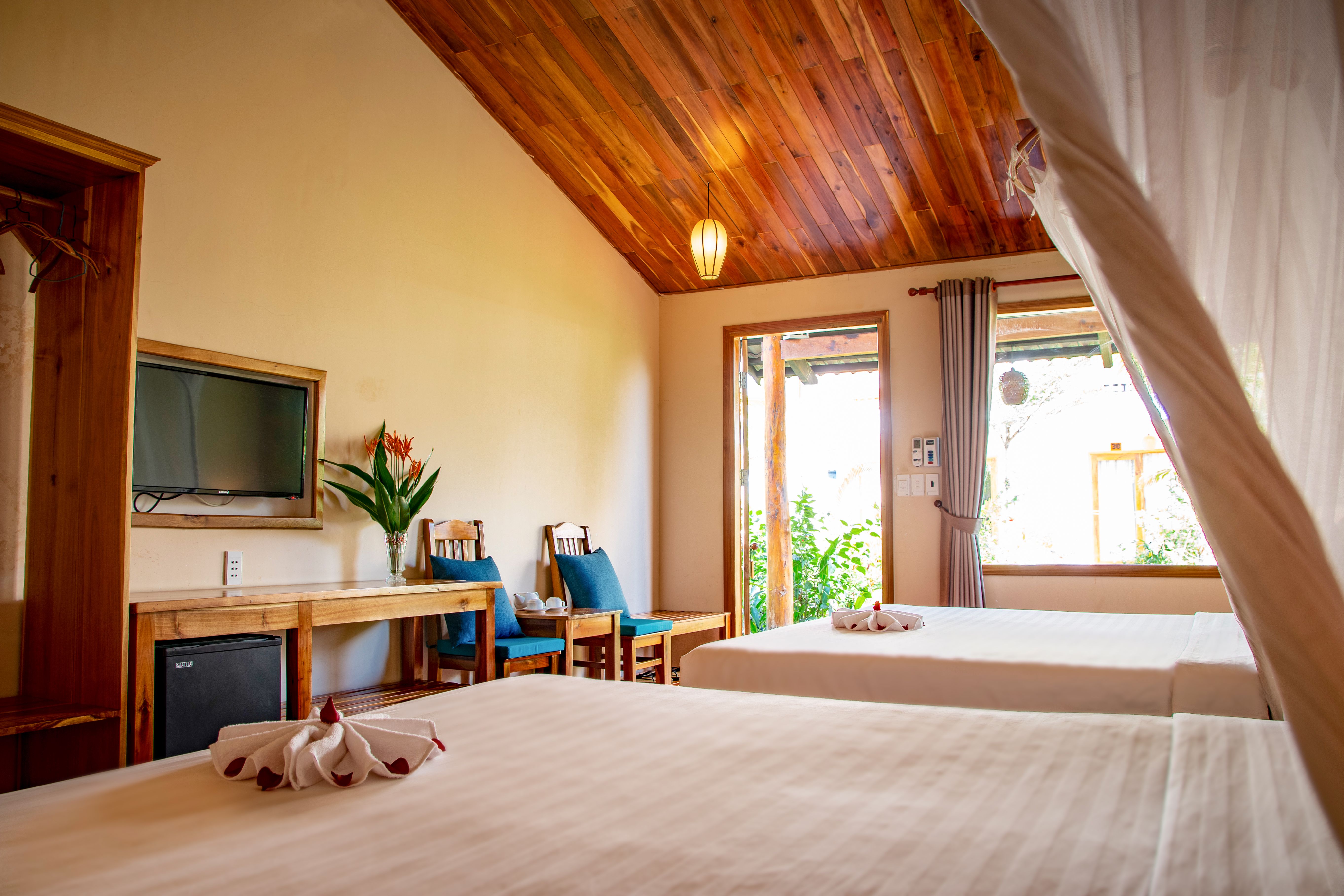 DELUXE SUITE DOUBLE GARDENVIEW WITH BALCONY